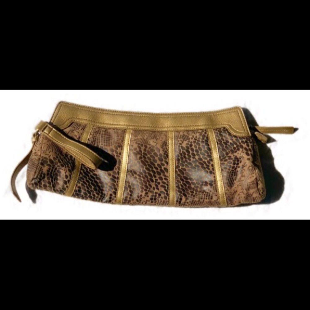 Donna Dixon wristlet leather tan brown